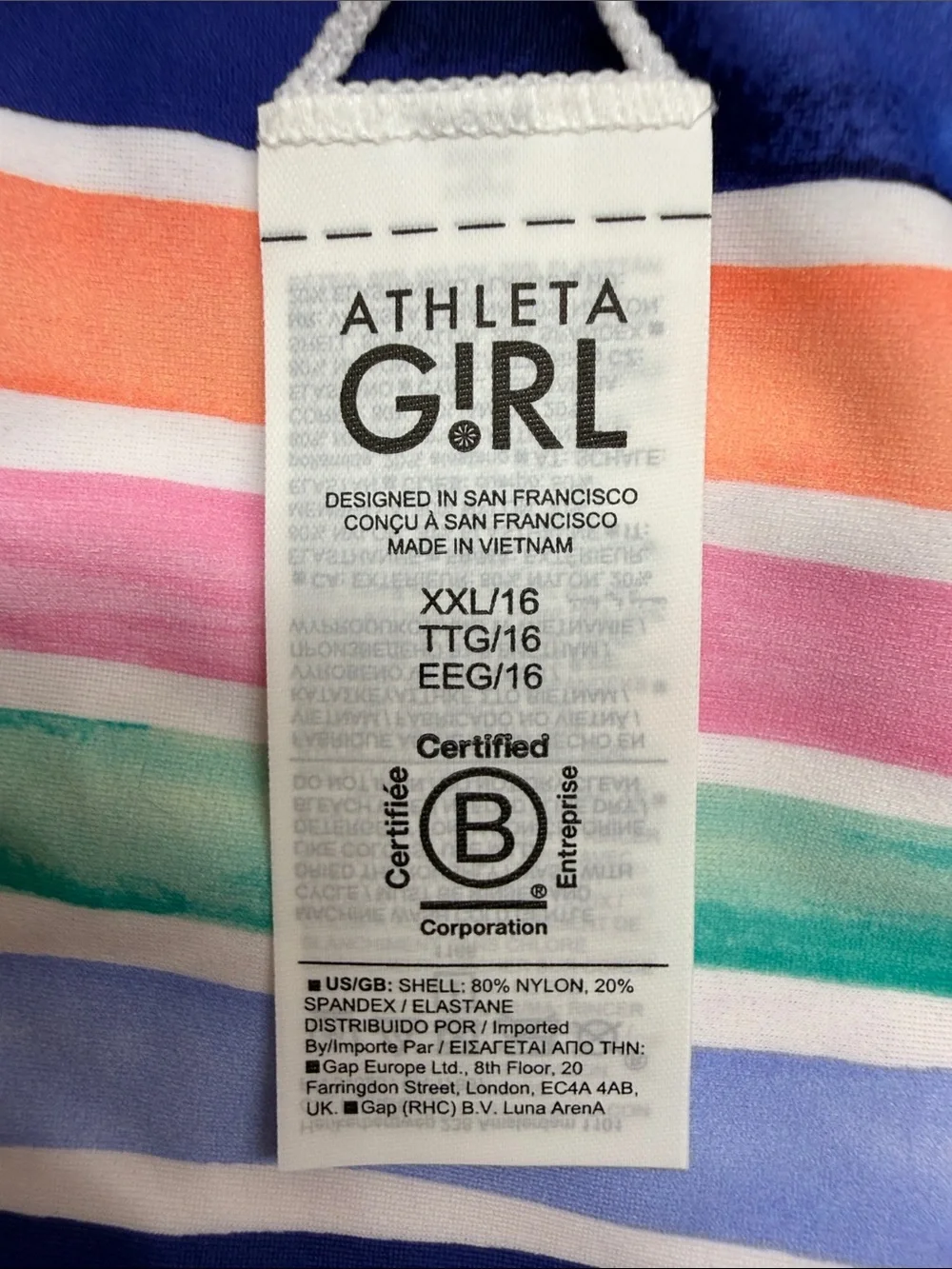 This Athleta Girl reversible bikini set high neck top and mid-rise bottoms